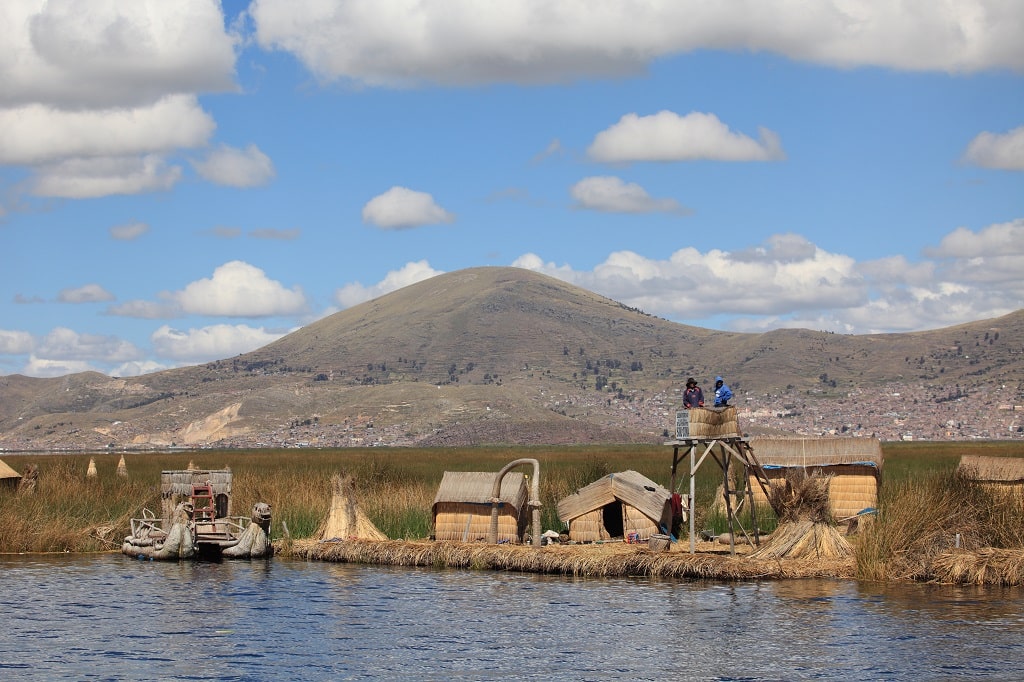 A view of reed houses floating on Lake Titicaca