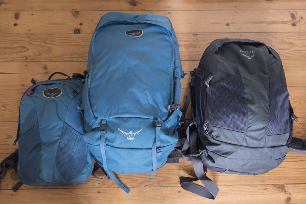 Osprey Farpoint 55 with detached daypack next to a Farpoint 40