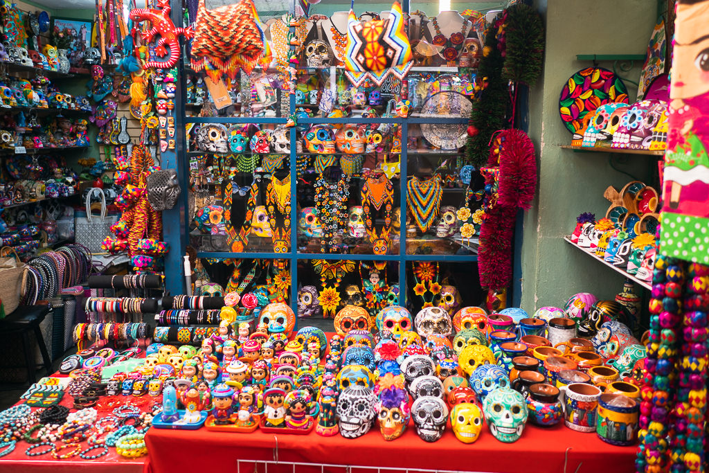 Numerous Mexican skulls and other artworks at the market