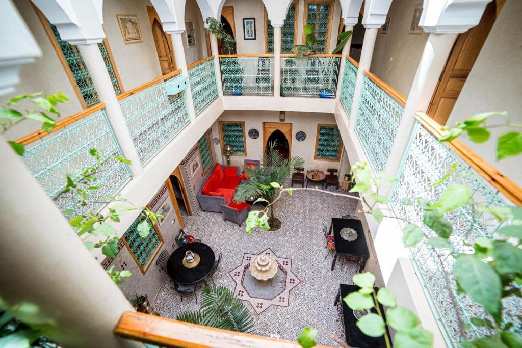 A view of the outdoor area in the middle of a riad from a second-story floor