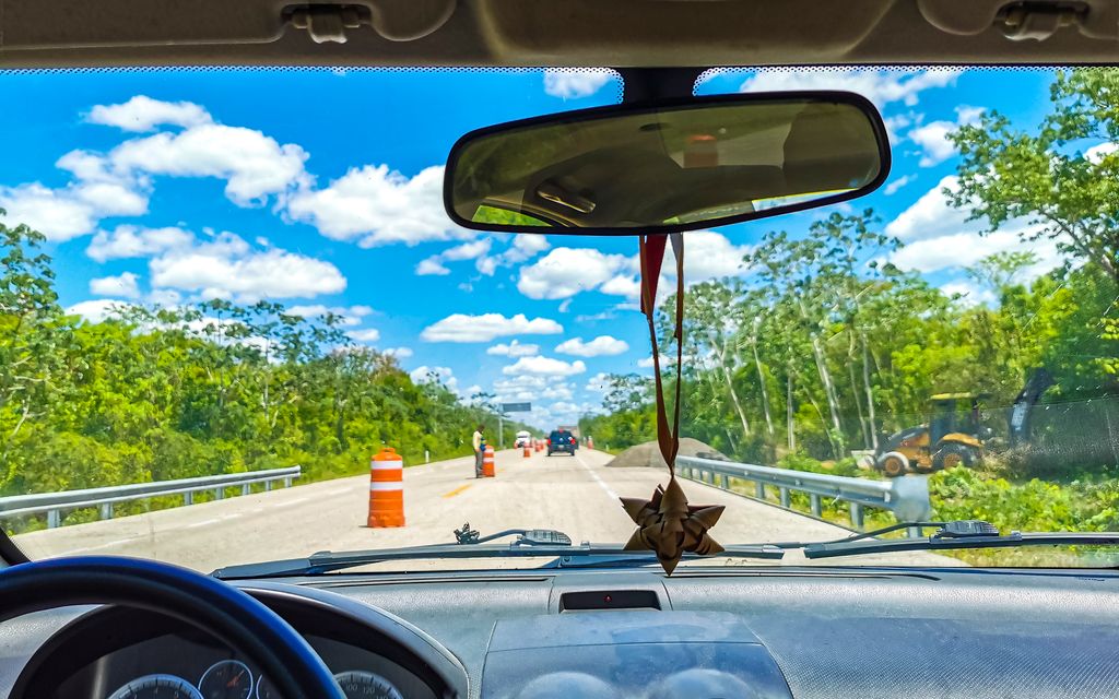 A road in Mexico being seen from inside a car