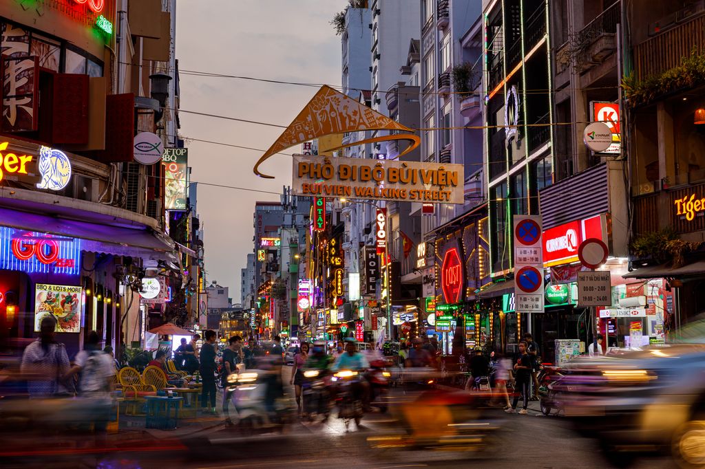 A crowded area at night in Ho Chi Minh Vietnam