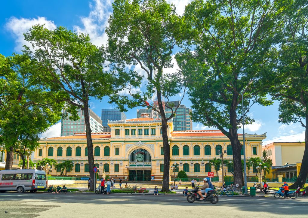 Central Post Office in Ho Chi Minh City, Vietnam surrounded by trees