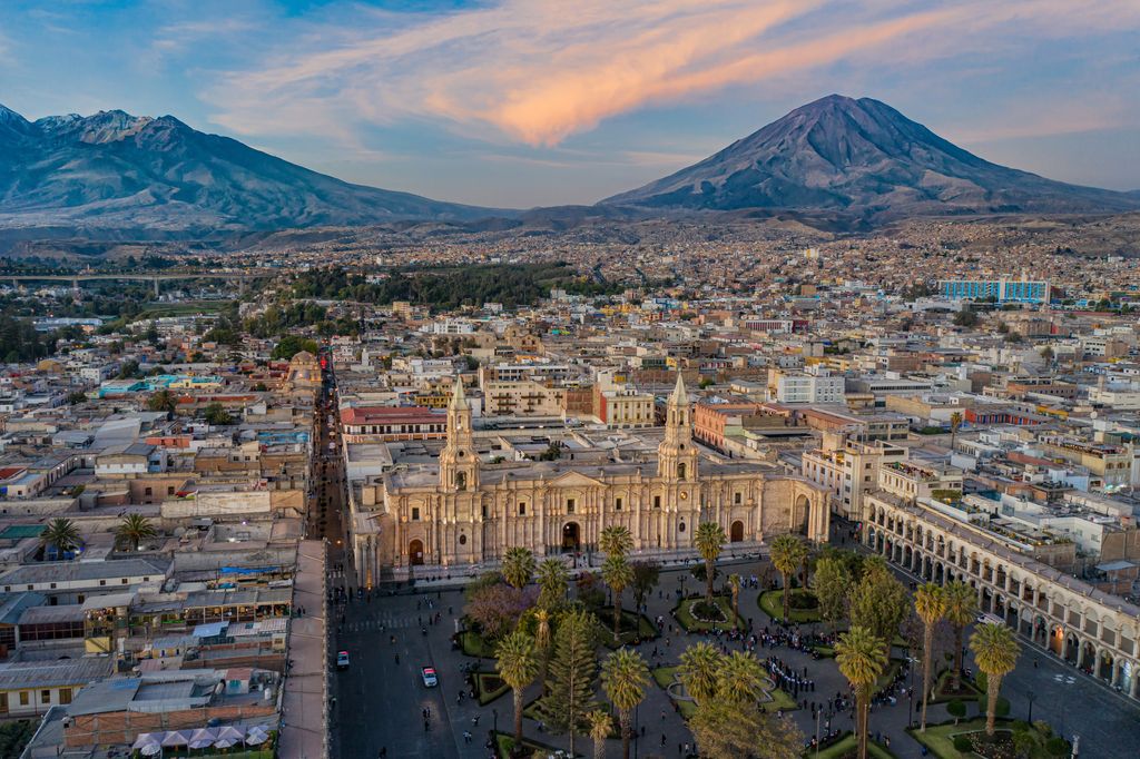 The Plaza Armas of Arequipa, Peru with volcano in the background