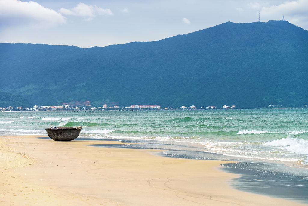 Son Tra Peninsula beach in Vietnam with mountains in the background