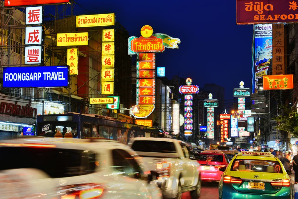 Cars on Yaowarat Road in Bangkok, Thailand.