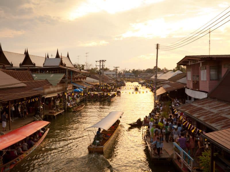 Boats floating at Amphawa Floating Market in Bangkok, Thailand.
