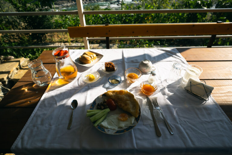 Sunlit breakfast table at Honey House Kastrioti