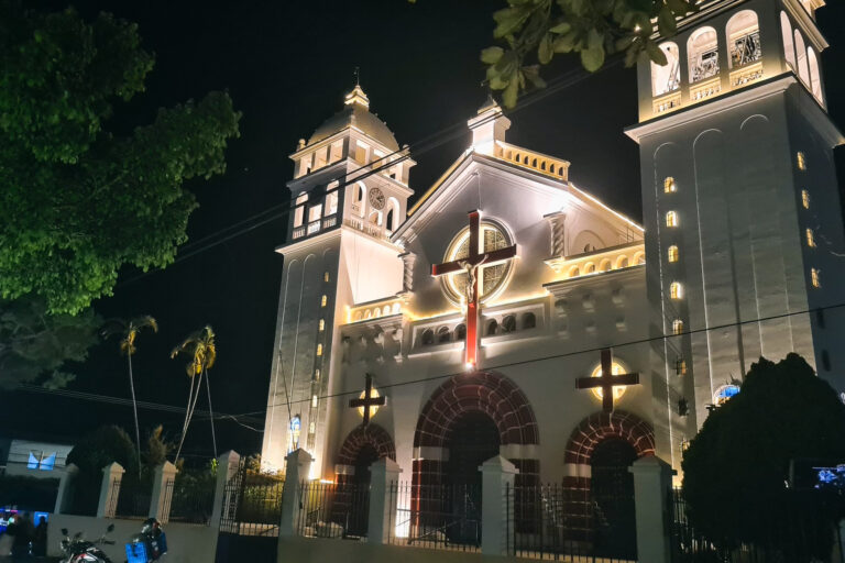 facade of Iglesia Santa Lucia in Juayua at night