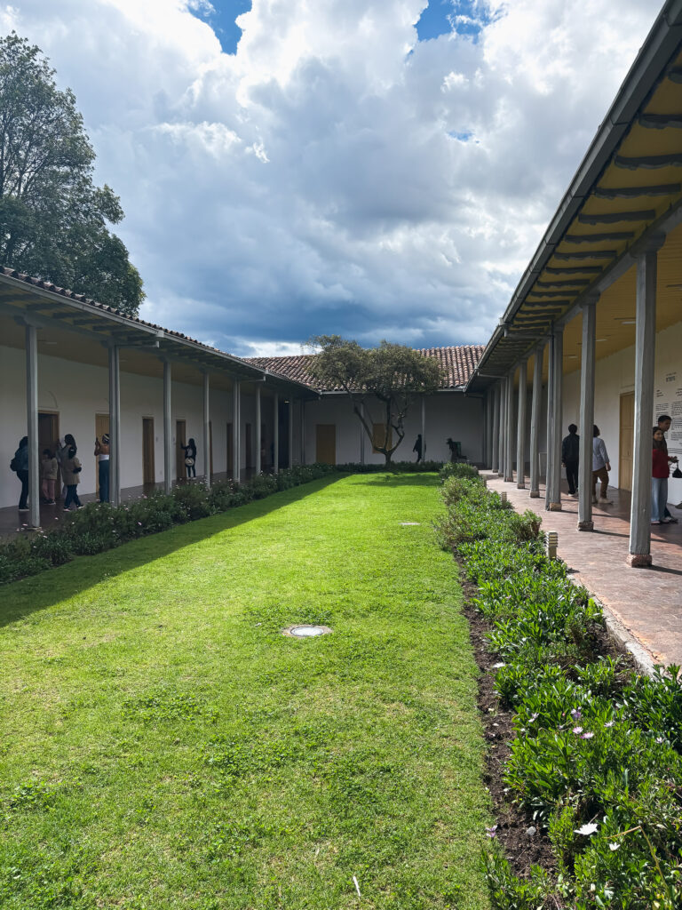 grassy courtyard lined by galleries at the Municipal Museum of Modern Art in Cuenca